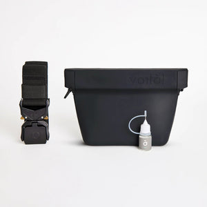 Voilà Standard Ultimate Treat Pouch | 16oz. in black with strap and bottle for on-the-go pet adventures.