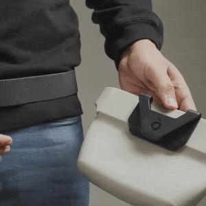 Adventure Clip for Voilà Treat Pouches attached to a belt, demonstrating versatility and ease of use.